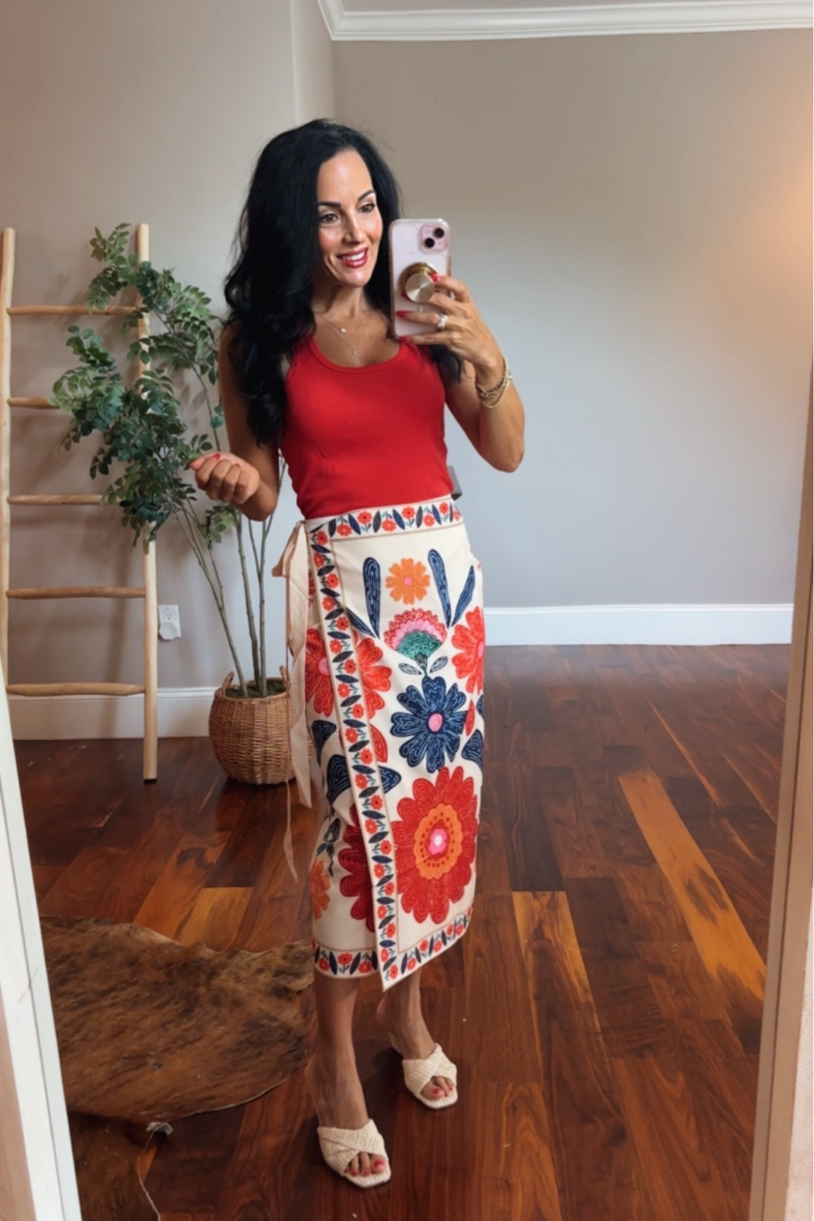 Wrap skirt with tank top and wedge sandals 

#LTKootd #LTKTravel #LTKOver40