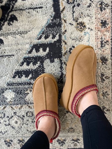AMAZING ugg slipper dupes. I’m wearing my true size, 8, room for socks too if I want to. So cute with leggings and jeans. Love the red braid detail and slight platform. Amazon finds, casual winter shoes. Chestnut dupe ugg slippers. 

#LTKshoecrush #LTKstyletip #LTKsalealert