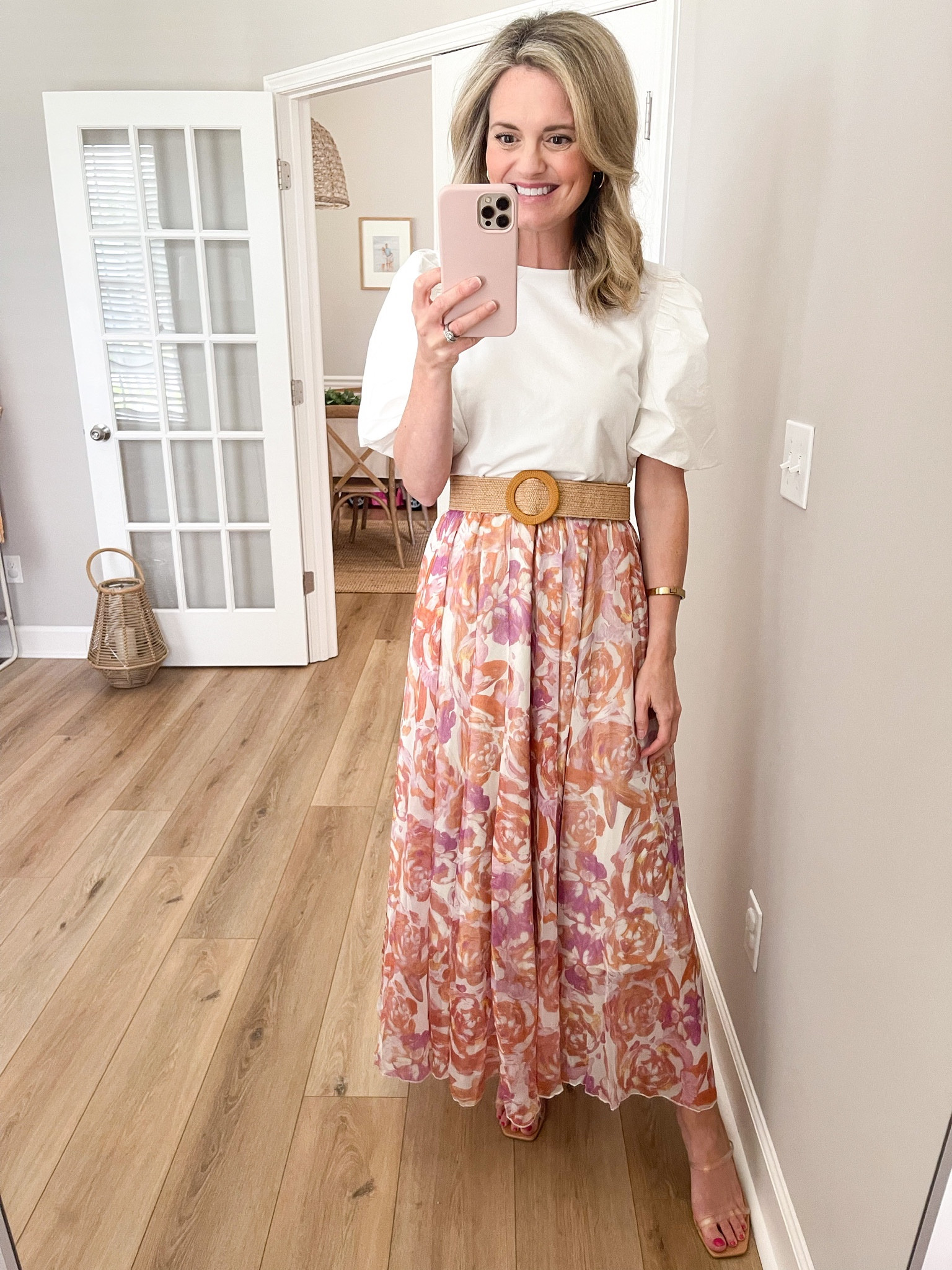 The colors in this skirt are so pretty with pinks and oranges and it’s fully lined. I paired it with my new go to top. I’ve been wearing it so much lately! The belt is a must have as well for elevating your skirts and dresses this summer.  I am wearing the size small skirt and top.

#LTKstyletip #LTKunder50 #LTKSeasonal