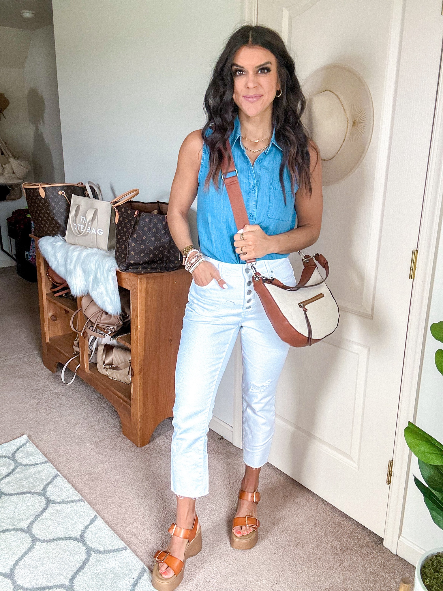 $16 Walmart chambray tank still fully stocked! I’m in size small. Sized up one in my white jeans 

#LTKfindsunder100 #LTKstyletip #LTKsalealert