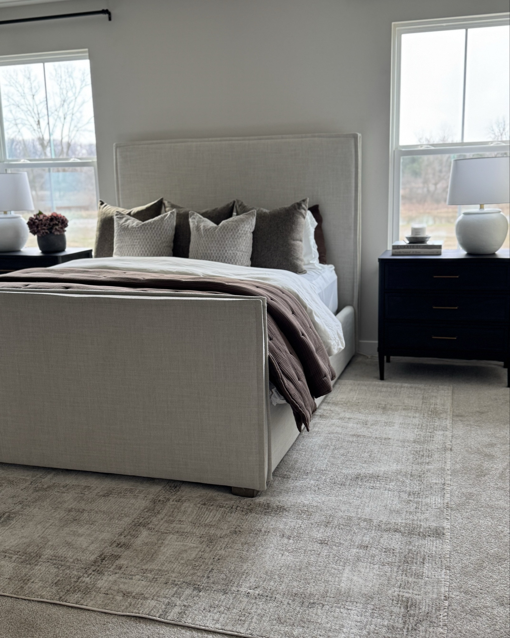 Bedroom decor, bedroom styling, brown bedding, brow quilt, plaid rug, ceiling fan, hunter fan, floral pillow covers, cream duvet, duvet insert, gray vase, black nightstand, gallery wall, Sausalito dresser, arhaus vase, white vase, brown candlesticks

#LTKSaleAlert #LTKSeasonal #LTKHome