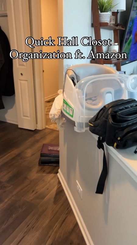 Easy hall closet organization with simple Amazon finds. Neutral storage baskets, cube storage organizer and sticky hooks to keep cleaning tools from falling over and jamming doors, getting tangled in coats, etc. A simple home organization project you can do in a quick afternoon!

#LTKhome #LTKfindsunder50 #LTKVideo