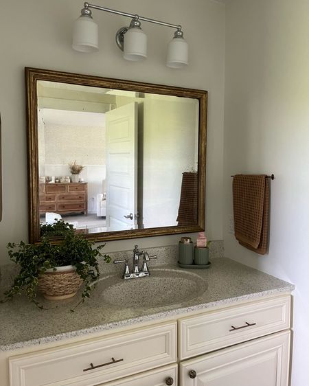 #ad #lowespartner 

bathroom refresh 🚿🌿✨ all updated polished chrome hardware is from Lowe’s - (faucet, light fixture, shower rod/rings). it’s a great place to shop for all of your summer projects! linked what we used below 🫶🏼 