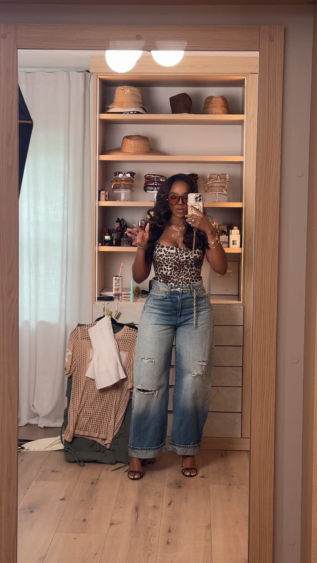 Hi Babes! 🐆🤍

Leopard is officially a neutral, and I’m obsessed with this casual-chic combo! The printed bodysuit paired with relaxed wide-leg denim is effortless, flattering, and so easy to style for everyday.

✨ Fit Details:
• Wearing a Size Small
• True to size
• Stretchy leopard bodysuit
• High-rise distressed wide-leg jeans
• Minimal strappy heels
• Gold accessories to pull it all together

🤎 Where to Wear:
• Brunch with the girls
• Dinner dates
• Shopping days
• Weekend outings
• Casual happy hour
• Vacation

✨ Style Tip:
Throw on a black blazer for an elevated look, or swap the heels for white sneakers to keep it casual. Leopard pairs beautifully with black, white, denim, and gold accessories!

Everything is linked below!

xx, Kira | IG: KirasFashionFinds

Measurements:
5'4" | Size Small | 140 lbs