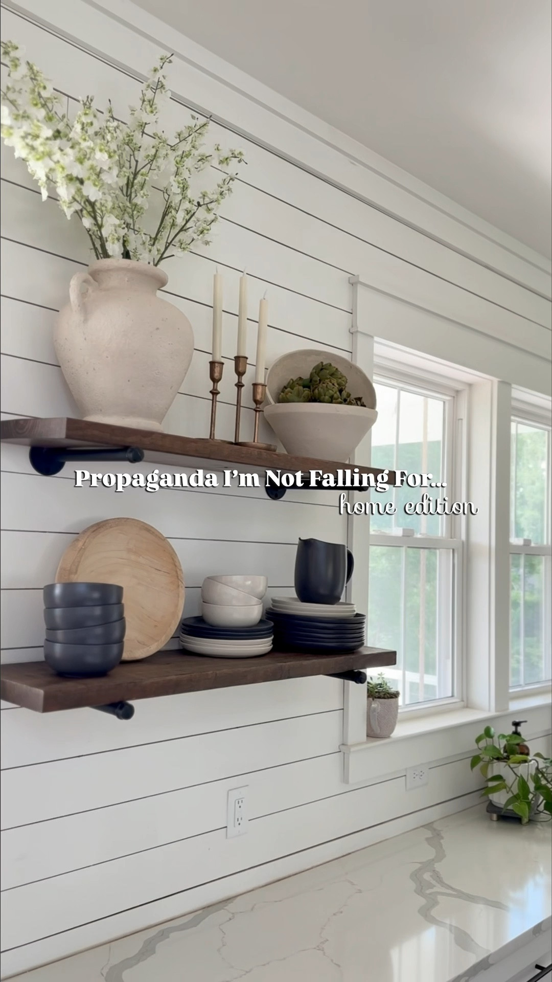 Apparently these three trends are “out”…but I still love every single one of them 😌

1. White cabinets = bright, classic, clean - just go with a warm or soft white vs. stark. Our cabinets and shiplap are Alabaster by Sherwin Williams.

2. Open shelves = easy access + curated styling. I love having a place to put pretty things that make me happy, like my plant babies! I am thinking of updating our shelves to a bit more modern style though!

3. Sink in the island = where I actually prep and live 🙃 I love my island sink because I can watch my kids play in the living room and participate in conversation while I wash dishes!

Just because it’s not trendy doesn’t mean it’s not right for you.

Design propaganda? Not falling for it.

What’s something “out” that you still love?

#LTKHome #LTKFamily #LTKStyleTip