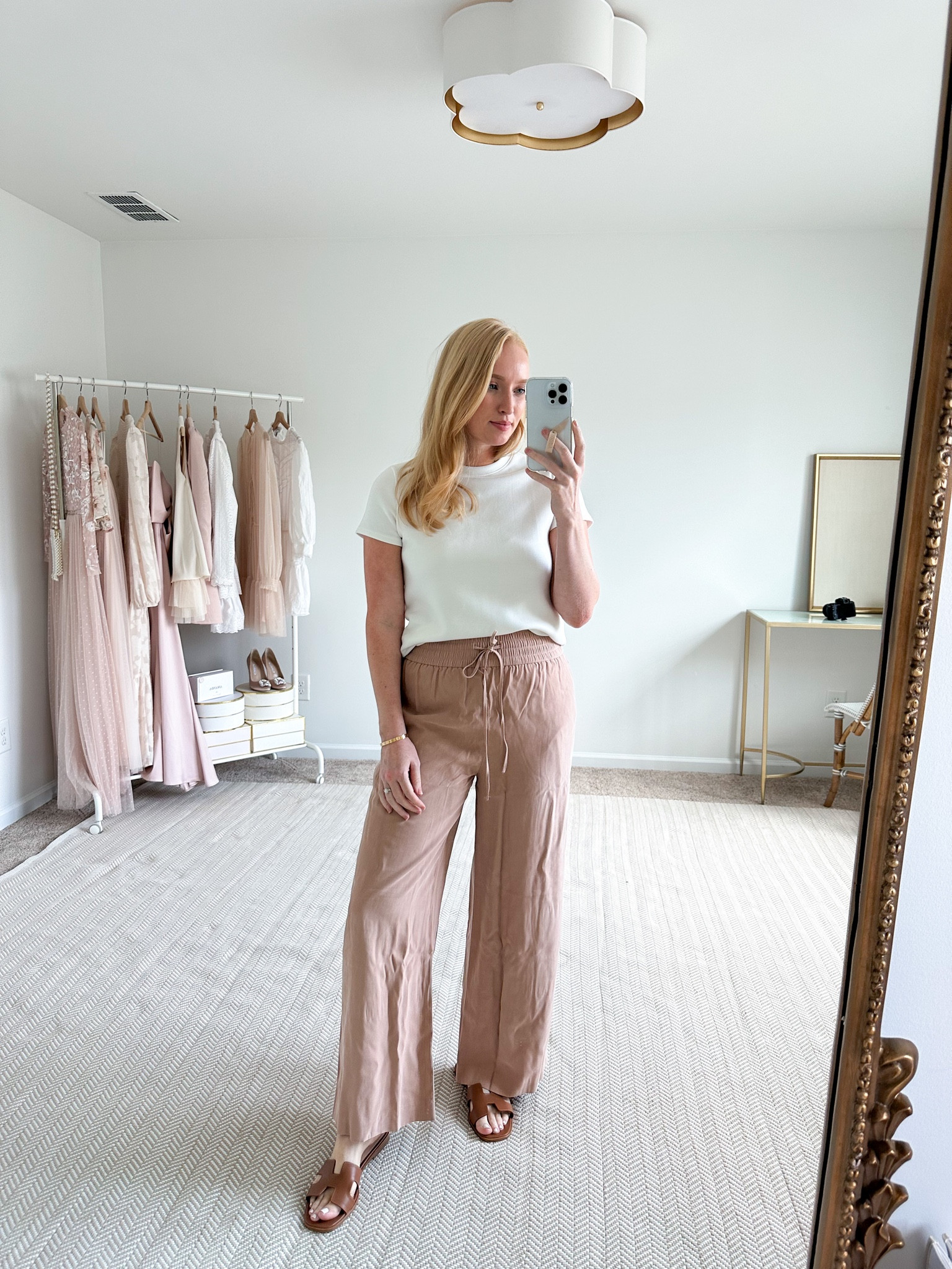 Comfy pants on sale! Wearing a size small. They have a thicker waistband and are very flattering for the lower tummy area! Great pant to wear casually or for travel days. Use code AMANDAJOHNxSPANX for 10% off the best white tee! Wearing a size small. It’s thick and opaque and so soft! 

Travel outfit // basic white tee 