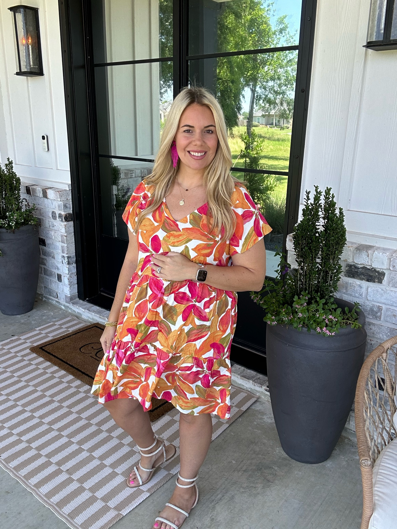 Such a cute flowy dress! It runs big so size down! This large fits me big at 19 weeks pregnant. Love the print and style plus it has pockets. Walmart dress. Bump friendly dress. 

#LTKBump #LTKOver40 #LTKWorkwear