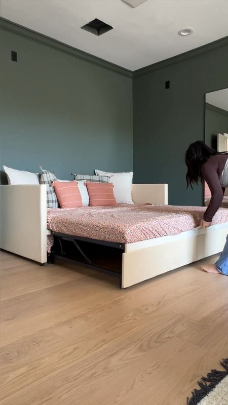 Getting this guest space ready for our friend’s daughters. Love how versatile this daybed is. It can be a king size bed or two twin beds. When it’s not in use it can be a daybed, perfect for lounging. Love these frames with the floral print. Also added the side table so they have a place to put their stuff down plus a floor lamp in case they want to do some reading. 

#LTKhome