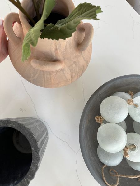 Obsessed with the texture on this decor. The footed bowl looks so good on a coffee table or center piece. The terracotta collection from Pottery Barn was the perfect addition for spring. Linking a few of my favorite faux stems.

#LTKhome #LTKstyletip