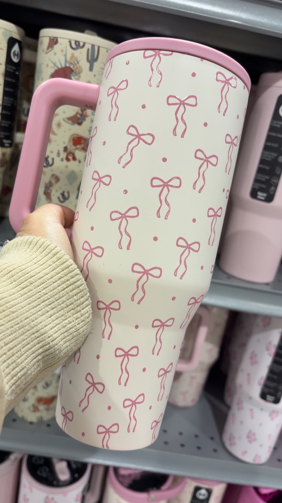 🎀 For Sale: Limited Edition HydroJug Pretty Please 40oz Traveler 🎀

Stay hydrated in style with this brand new, exclusive HydroJug Traveler tumbler featuring an adorable pink bows pattern on a cream background! This 40oz capacity, stainless steel bottle is the perfect blend of fashion and function, ideal for your active lifestyle.

Key Features:

Capacity & Insulation: Generous 40oz capacity with triple-wall stainless steel insulation keeps your drinks cold for hours.

Leakproof Design: No spills, no stress. It's completely leakproof with the straw down, so you can toss it in your bag worry-free.

Convenience:

Cup Holder Friendly base fits most standard car cup holders.

Ergonomic Handle for comfortable carrying on the go.

Hygienic Flip Straw with a soft-touch, ambidextrous lid for easy sipping.

Dishwasher Safe for easy cleaning.

Durable & Safe: Made from premium, food-grade 18/8 stainless steel with a non-slip rubber base. It is BPA-free.

This is a DSG (Dick's Sporting Goods) exclusive model, so get it while you can!

#LTKTravel #LTKfitnessgoals #LTKActive