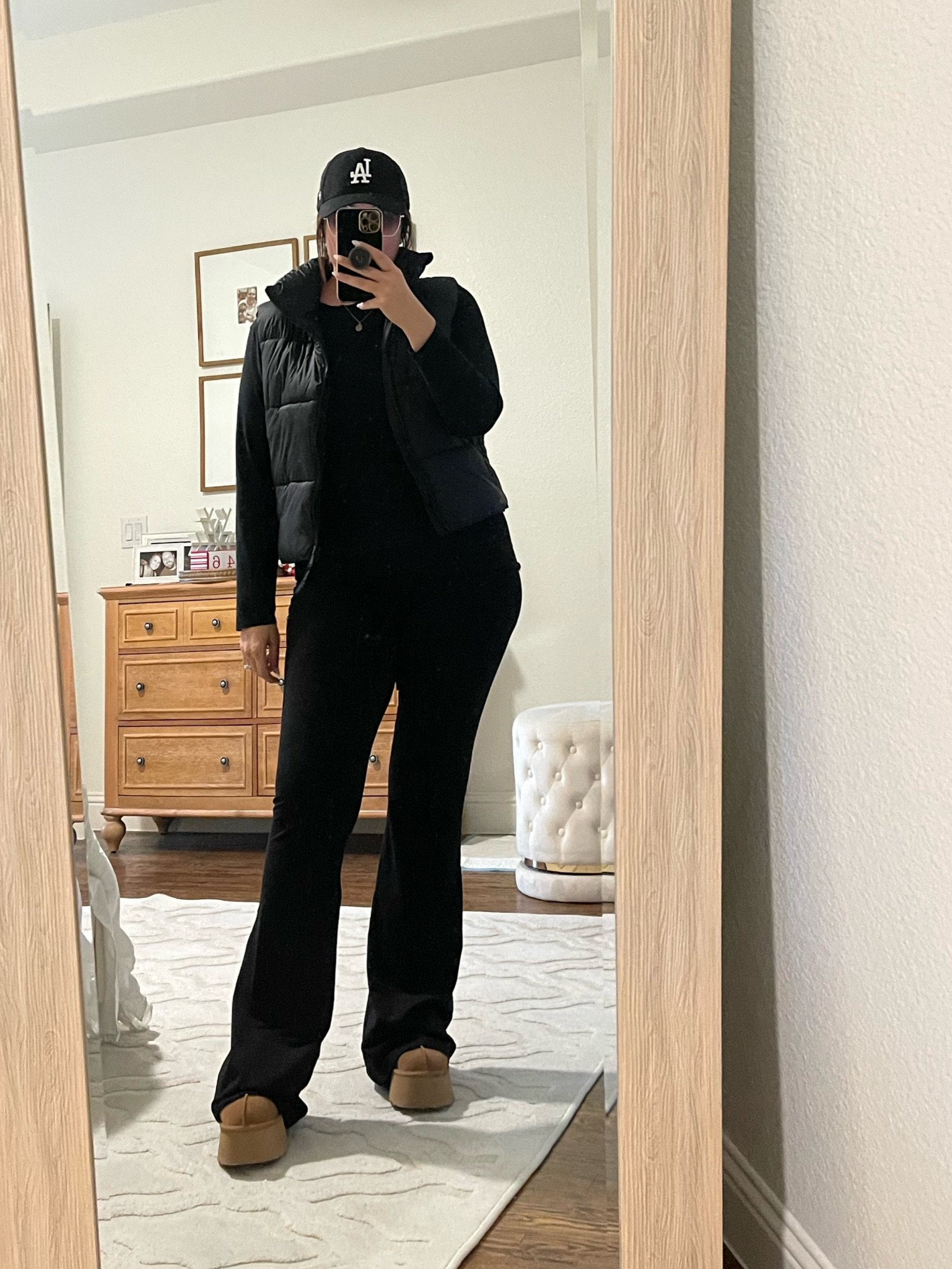 Loving these flare leggings from old navy! Puffer vest is old navy too! Uggs, ball cap, leggings, puffer vest, travel outfit, comfy outfit 

#LTKtravel #LTKsalealert #LTKSeasonal