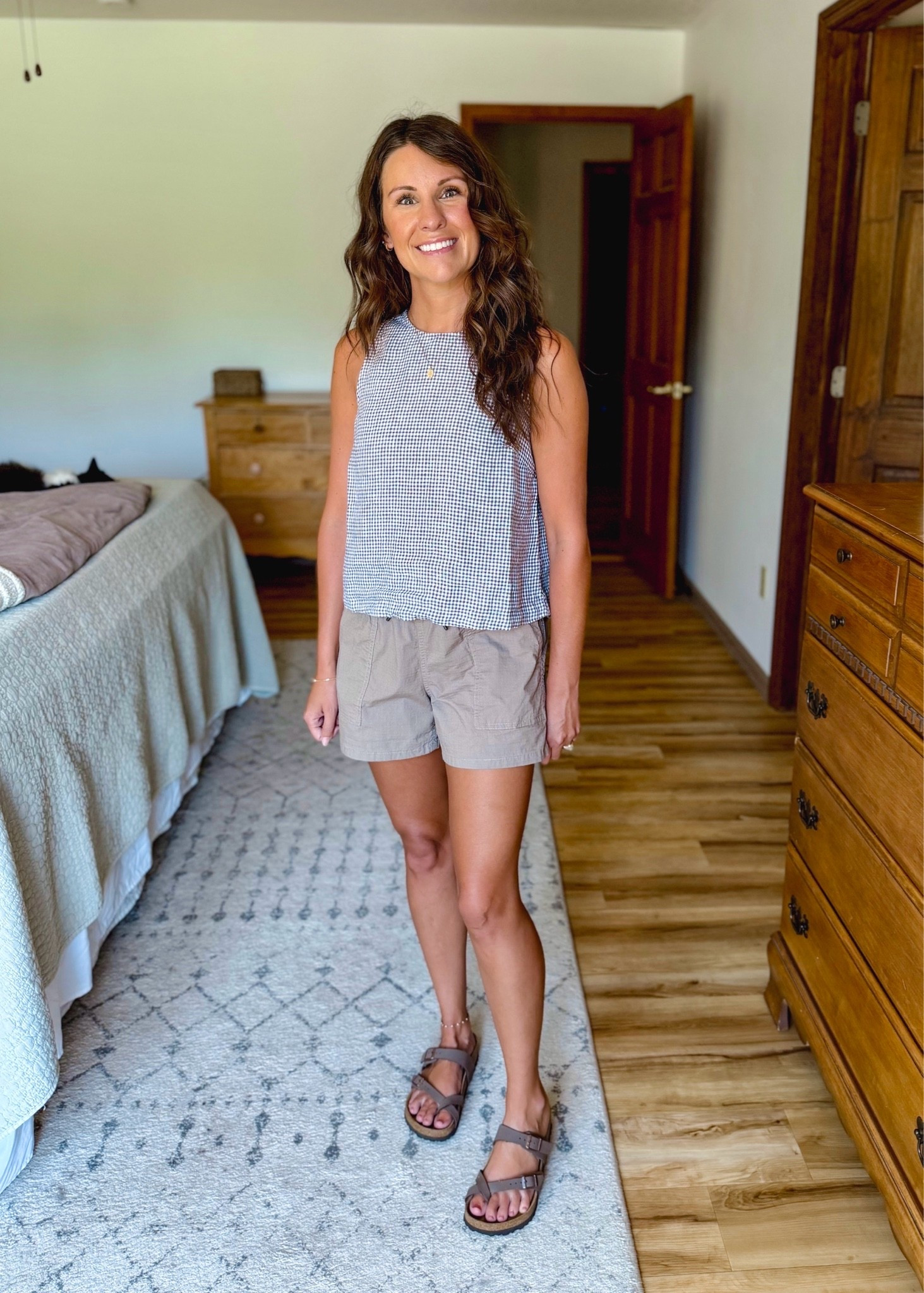 xs in the linen brown and white gingham tank and xs in the ripstop shorts. My sandals are size 36.