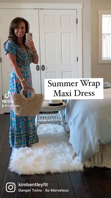 The bright floral v-neck wrap maxi dress. So fun, comfy, and flattering. Wear this maxi dress to summer festivals, on vacations, to wedding showers, and nights out. Don’t forget the raffia handbag!
I’m wearing a size small and wedges  
kimbentley, spring dress,summer outfit, festival,

#LTKVideo #LTKFestival #LTKSeasonal