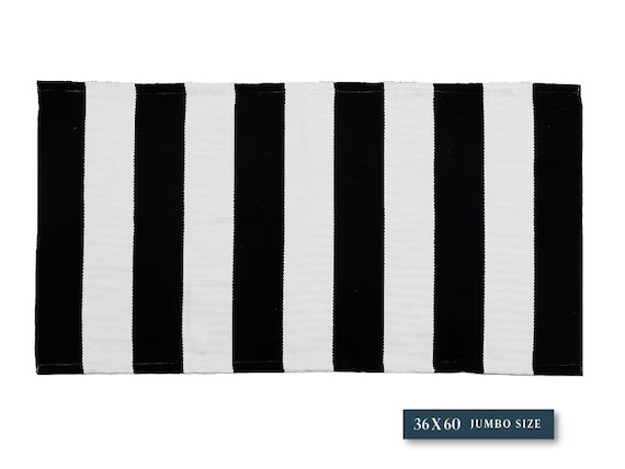 Read the full title
    Black and White Vertical Striped Indoor/Outdoor Rug | Layering Rugs | 36 ... | Etsy (US)