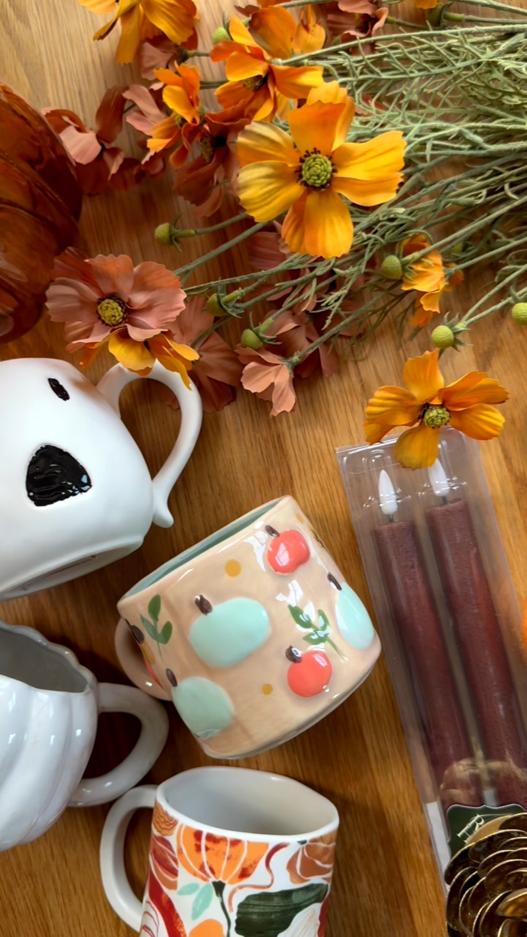 (9/4/25) Warm woods, layered textures, and some colorful autumn touches!🍁✨ I've been wanting to add some more color to my fall decor and I feel like the coffee mugs, fall wall art, and icon glasses do the trick perfectly!!

All stems, the candle holder, and the light up pumpkin are from Hobby Lobby! 

 

#LTKSeasonal #LTKHome #LTKFindsUnder50