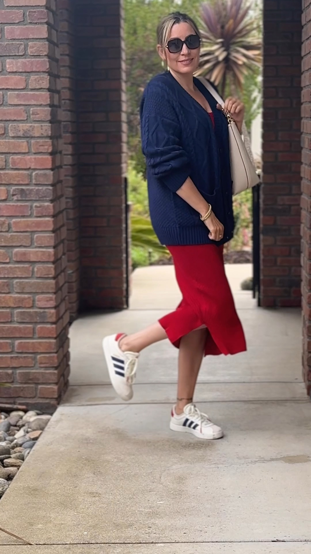 Stepping into fall with bold colors and effortless style! 🍂 Pairing my cozy oversized knit with a pop of red and classic kicks for a look that's both chic and comfy. #FallFashion #CasualChic #StyleOver40 #J.Crew #adidas #coach

#LTKMidsize #LTKVideo #LTKOver40