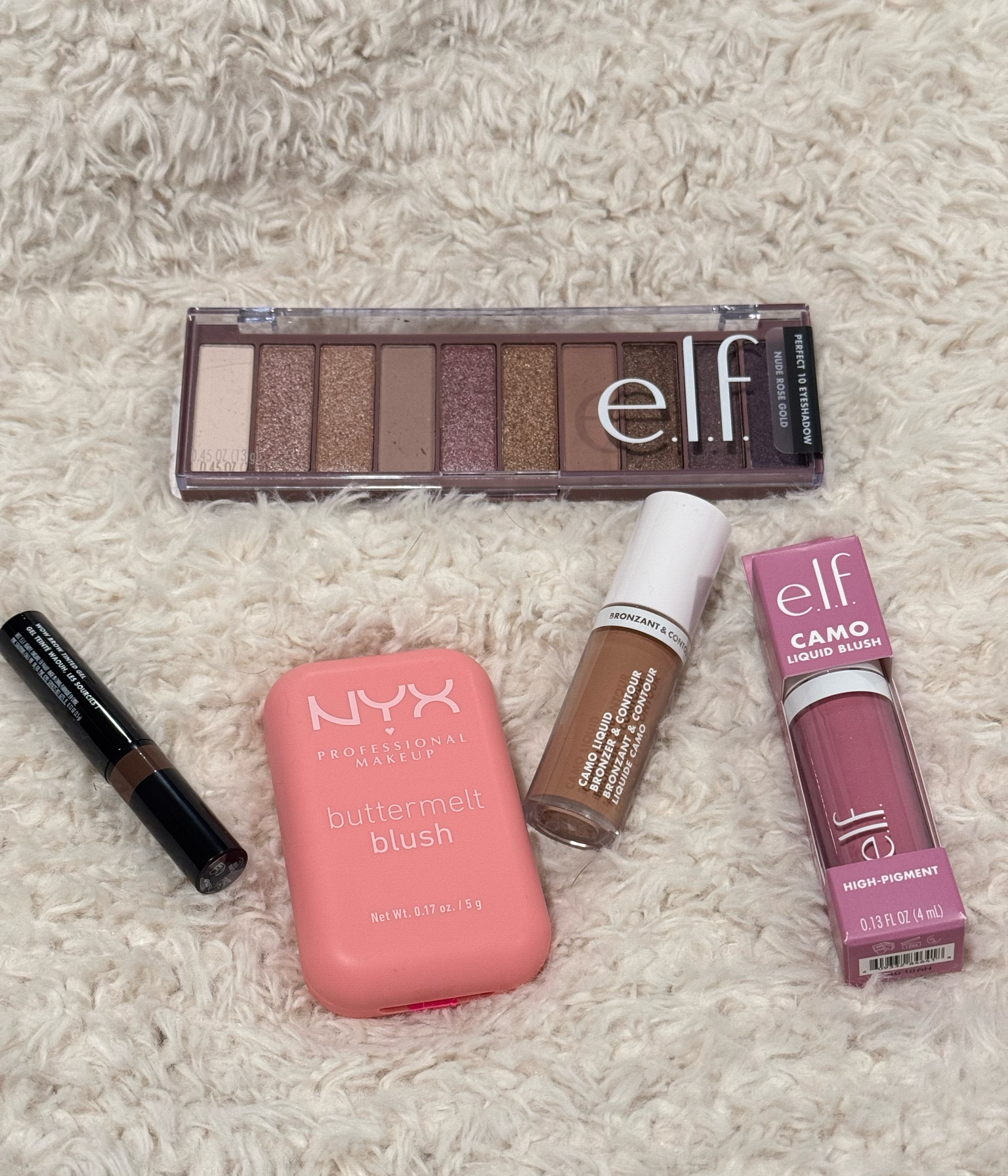 Drug store makeup buys I am loving. The lilac liquid blush and liquid contour is literal perfection. 

#makeup #budget #drugstore #elf #budget

#LTKMostLoved #LTKBeauty