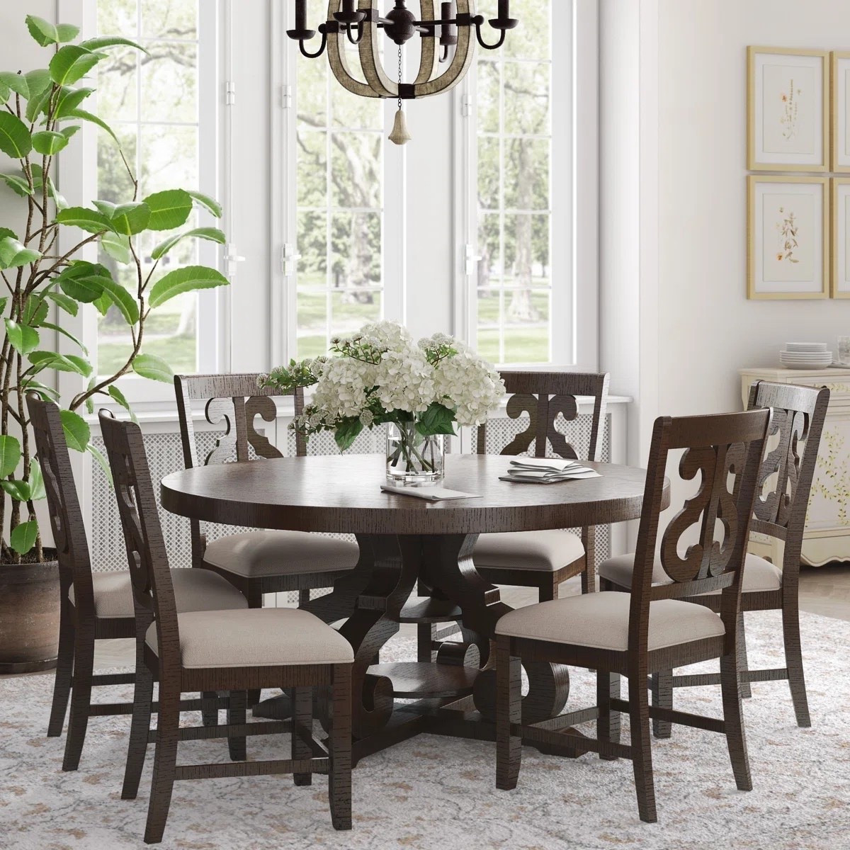 Inspired by classic elegance with a modern touch, the Anosha Round Pedestal Dining Set with Upholstered Side Chairs creates a warm, inviting centerpiece for any dining space. The round pedestal table encourages easy conversation, while the upholstered chairs add comfort and refinement. ON SALE and under $1,500.

Keywords:

* round dining table set
* pedestal dining table
* upholstered dining chairs
* dining room furniture
* kitchen dining set
* modern dining set
* round kitchen table
* elegant dining set
* family dining table
* small space dining furniture
* contemporary dining room
* home dining furniture
* conversation dining table
* cozy dining room décor
* stylish dining set
* apartment dining table
* upholstered chairs set
* modern traditional furniture
* round pedestal table
* entertaining furniture

#LTKSaleAlert #LTKHome #LTKSeasonal