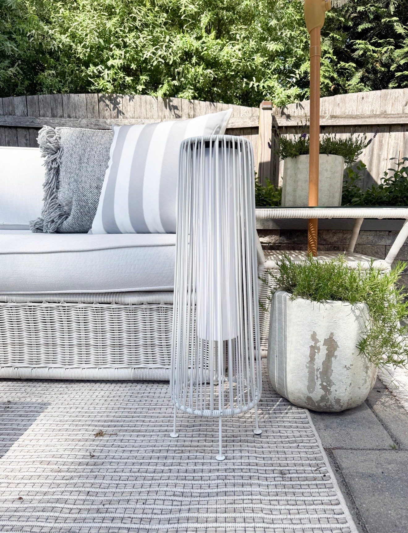 These solar floor lamps are one of those pieces that instantly make an outdoor space feel elevated and cozy. I love how they add soft lighting at night while still blending seamlessly into a neutral patio setup with woven textures, oversized planters, and layered outdoor decor. Outdoor patio styling, Solar floor lamps, Neutral patio decor, Backyard inspiration, Outdoor entertaining, Woven outdoor furniture, Patio lighting ideas, Luxury outdoor decor, Summer patio styling, McGee and Co inspired patio, Coastal outdoor decor, Girl on the Hudson

#LTKHome #LTKSeasonal