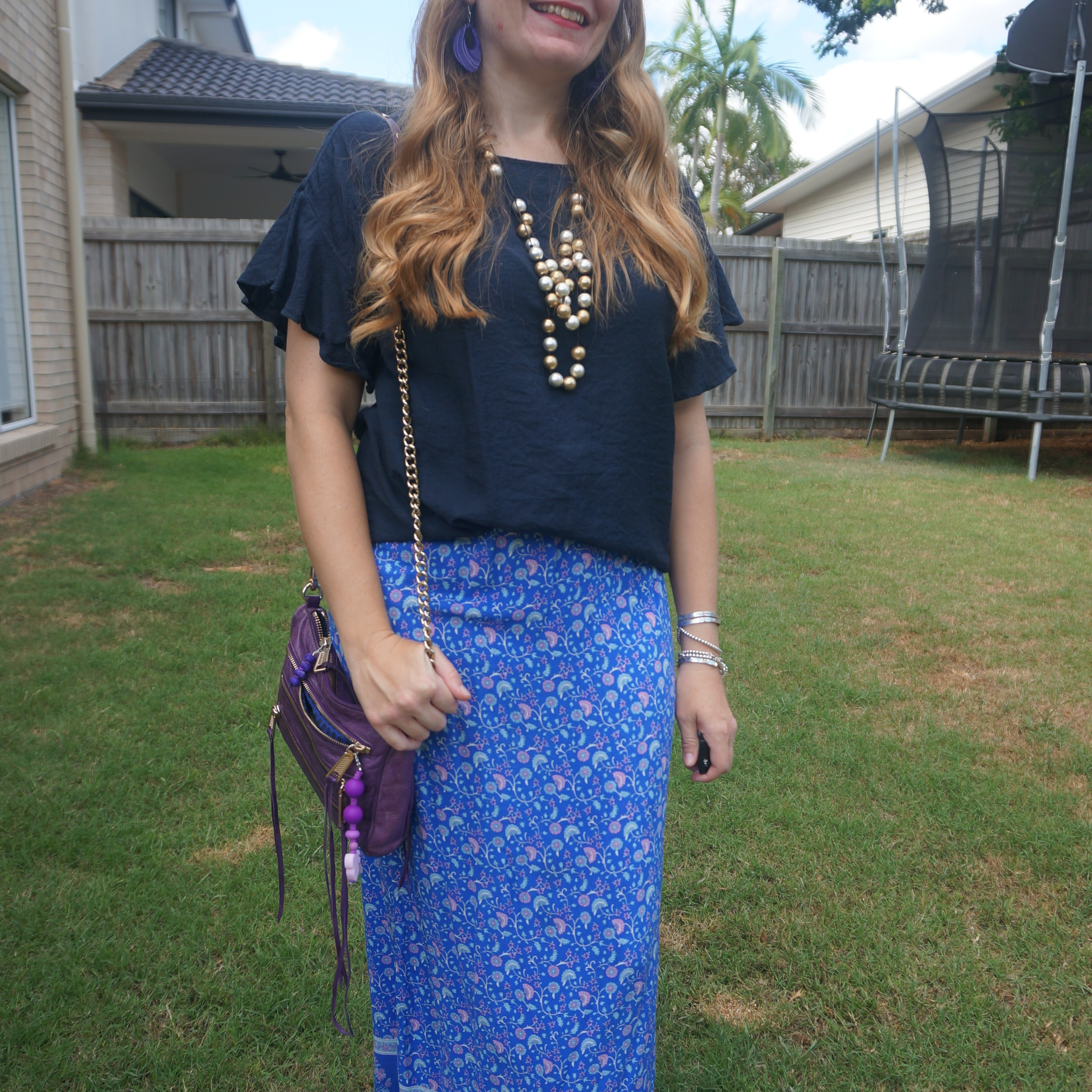 Navy statement sleeve blouse with blue floral print maxi skirt and purple Rebecca Minkoff mini 5-zip bag 💙

#LTKbag #LTKsummer #LTKaustralia