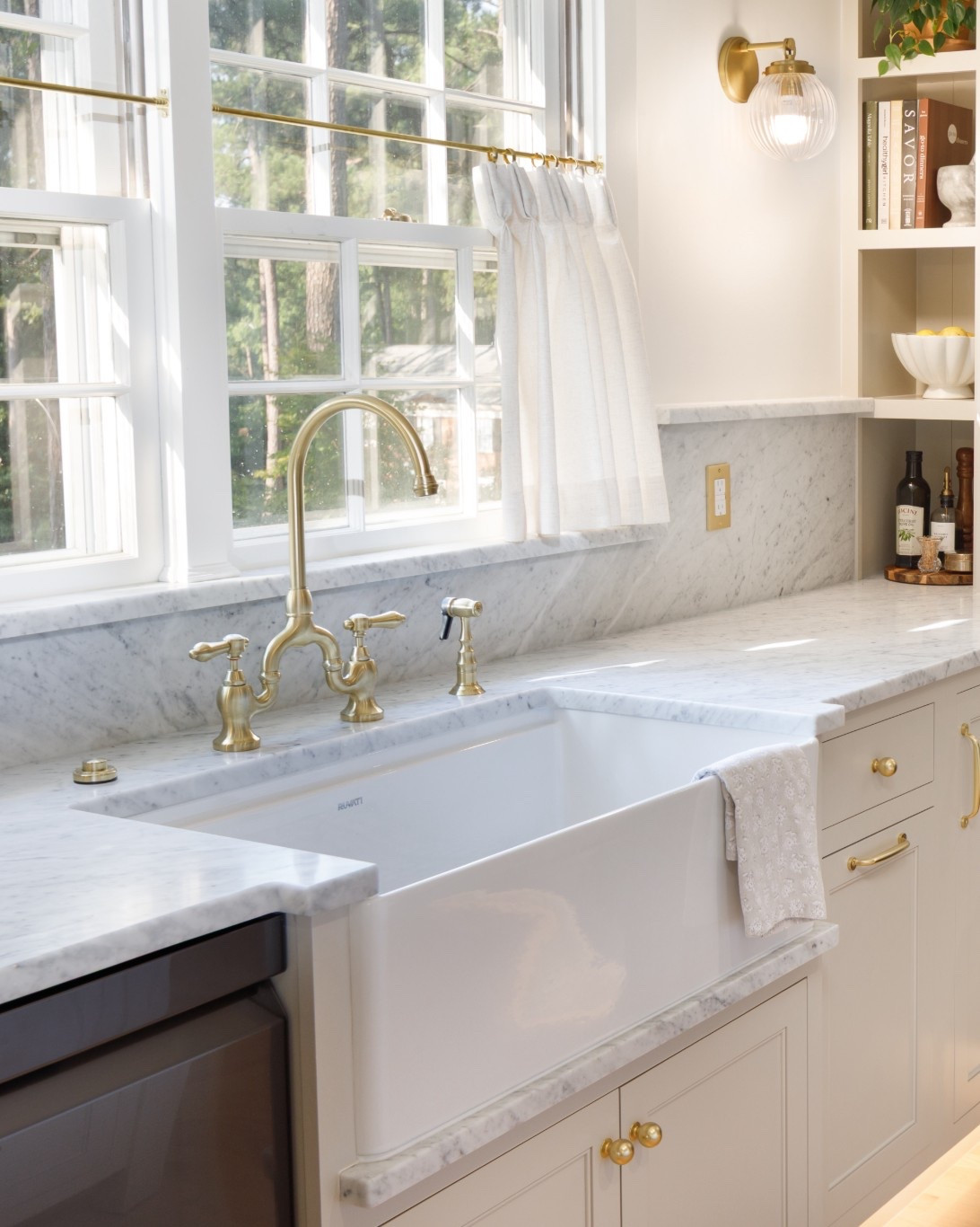 The heart of the kitchen is always the sink ✨ Loving this @ruvati farmhouse workstation paired with @kingstonbrass faucet and @rejuvenation  hardware - functional, stylish, and perfect for everyday workflow. Linked all my favorites so you can shop the look! 🛠️💡

#KitchenInspo #FarmhouseSink #KitchenStyle #HomeOrganization #FunctionalDesign #LTKHome #LTKKitchen #InteriorDetails


#LTKvlog #LTKdayinmylife #LTKHome
