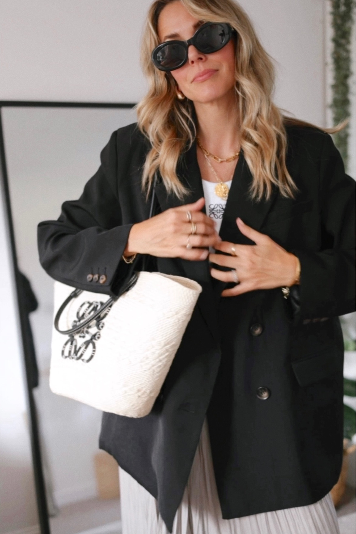 Black blazer 
Basket back 
Satin suit 
Slip skirt 
Maxi skirt 
Racer vest 

#LTKSeasonal #LTKeurope #LTKstyletip