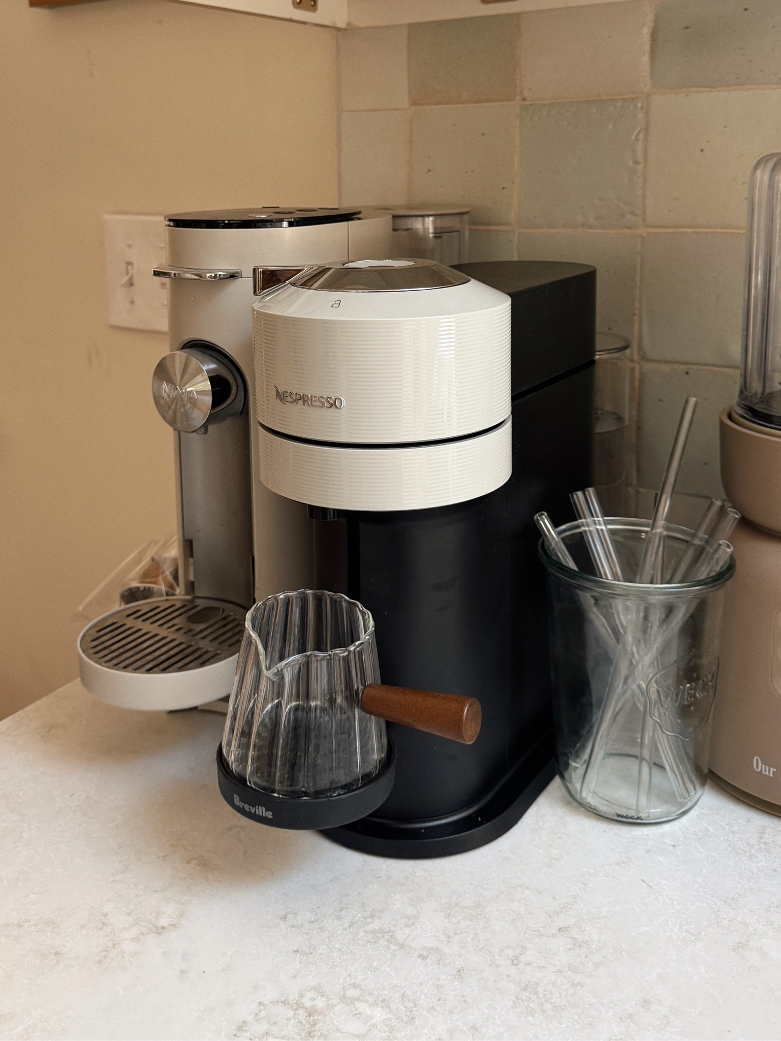 My Nespresso machine! Love how the water tank is hidden in the back it's so much sleeker that way!