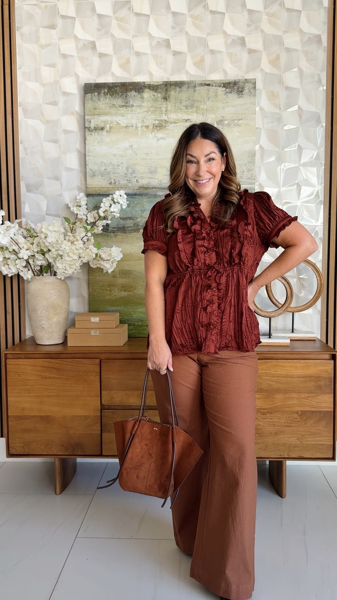 🍂 @Anthropologie Crinkle-pleated satin with a ruffle placket and soft peplum waist, with  cinnamon wide-leg linen trousers. Dressy enough for a big meeting day, comfortable enough to sit in from 8 to 5.

Top size large  • Pants run small wearing 12 prefer 14

#LTKmomlife #LTKMidsize #LTKOver40