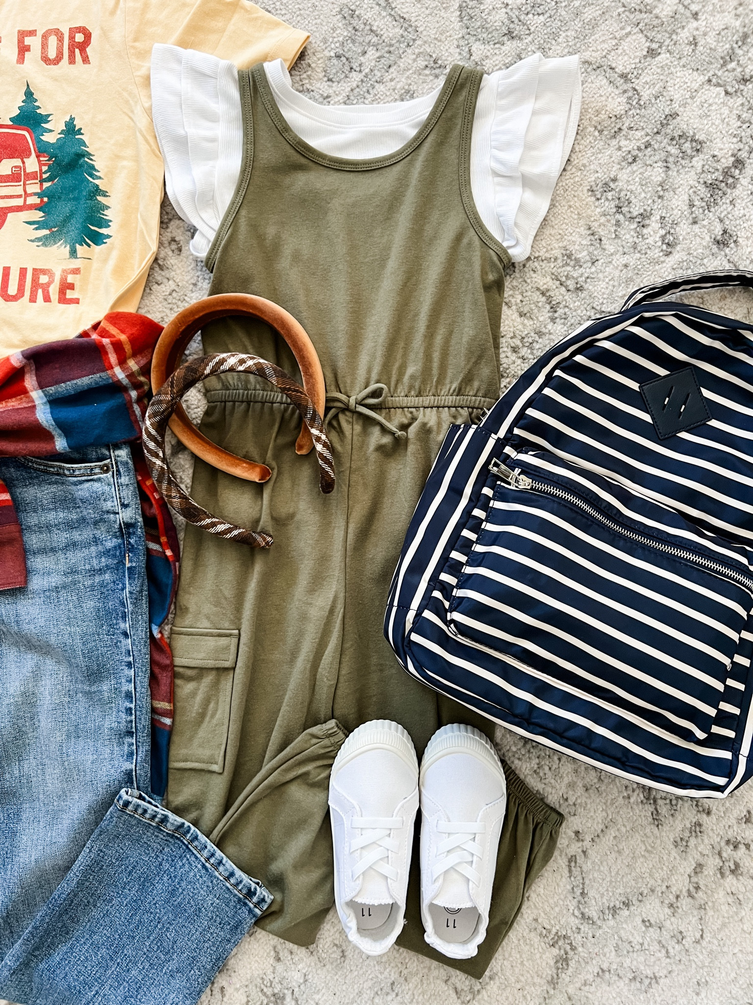 Walmart girls jumpsuit by Wonder Nation, fits true to size (looks big but surprisingly my 6 year old fits in the size 6). Fun alternative to leggings and dresses (my daughter is slim so a lot of jeans and pants don’t stay up! She loves this outfit.) The ruffle top runs big but I still got her the 6 so she has some room to grow with it.

#LTKKids #LTKStyleTip #LTKFindsUnder50