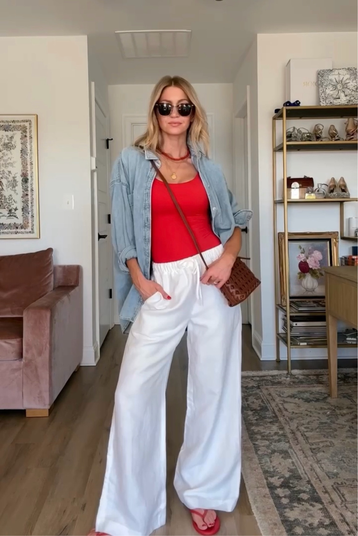 Red one piece swimsuit styled with white linen pants + denim top. 
Swimsuit: runs TTS, wearing size small, long torso 
Pants: run TTS, wearing size small
Denim top: runs slightly oversized, wearing size small 

#LTKSeasonal #LTKSwim #LTKTravel