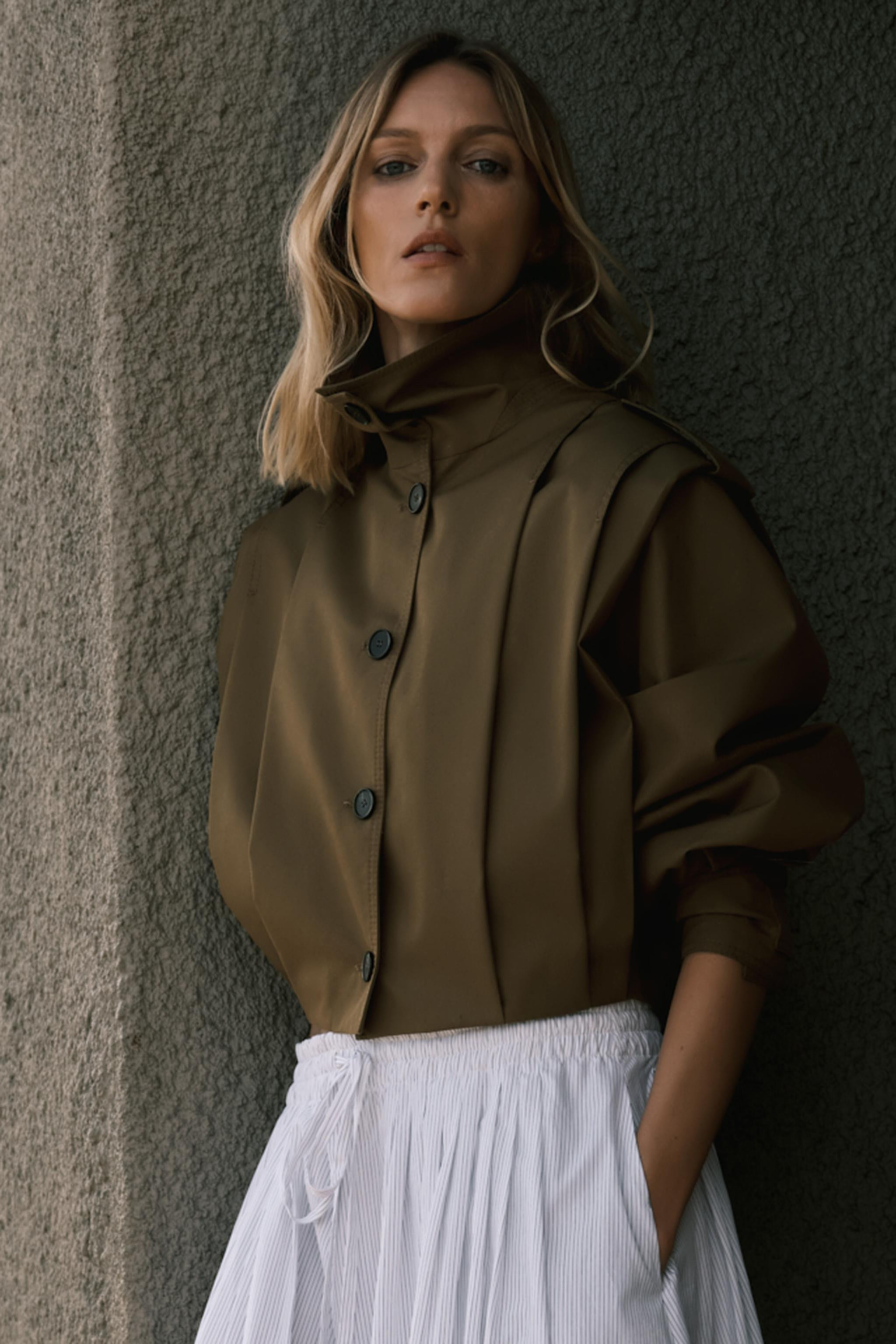 ZARA WOMAN COLLECTIONJacket made of a cotton-blend knit. High collar and long sleeves with tab cu... | Zara US