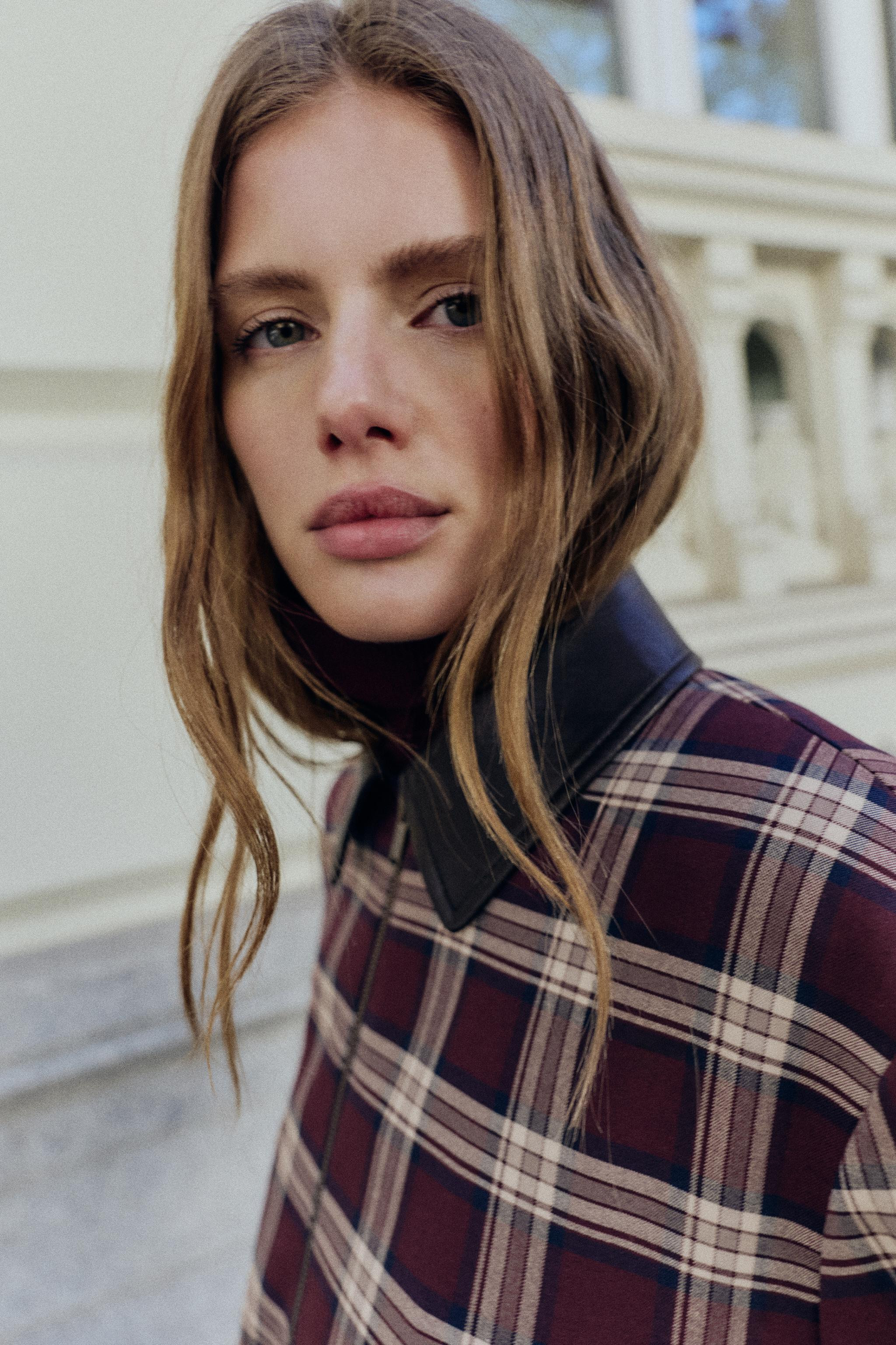 Bomber jacket with high collar and long sleeves. Front zip pockets. Elastic trim. Front zip and h... | Zara US