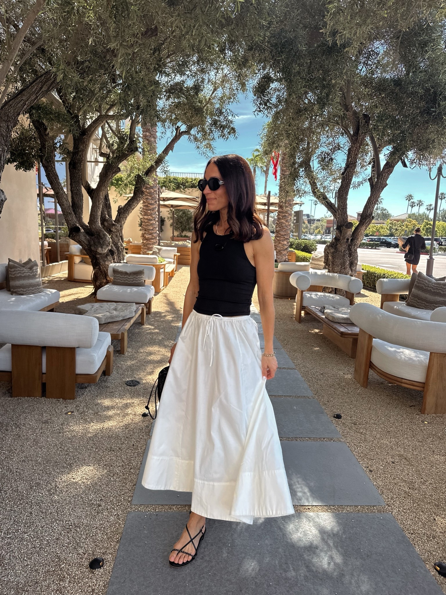 Today’s outfit for an anniversary lunch 
Skirt is 100% organic poplin cotton true to size and short gal friendly in petite sizing 
Tank has a built in bra and a smooth ribbed finish. Tts 

#LTKOver40 #LTKPetite