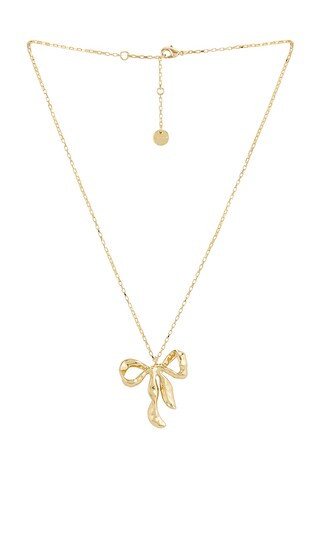 Mottled Gold Bow Pendant Necklace in Gold | Revolve Clothing (Global)