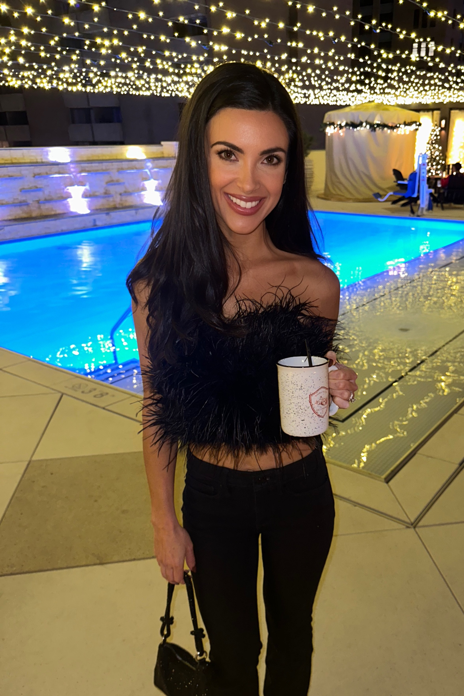 Black fur top and flare jeans 

#LTKfindsunder50 #LTKCyberWeek #LTKfindsunder100
