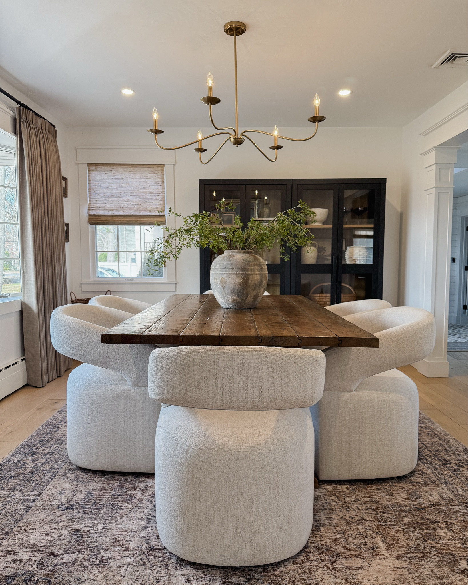 Organic modern dining room furniture and decor. 🤎

dining table | chairs | chandelier | lighting | vase | branches | drapes | curtains | area rug | shades | branches

#LTKvlog #LTKSaleAlert #LTKHome