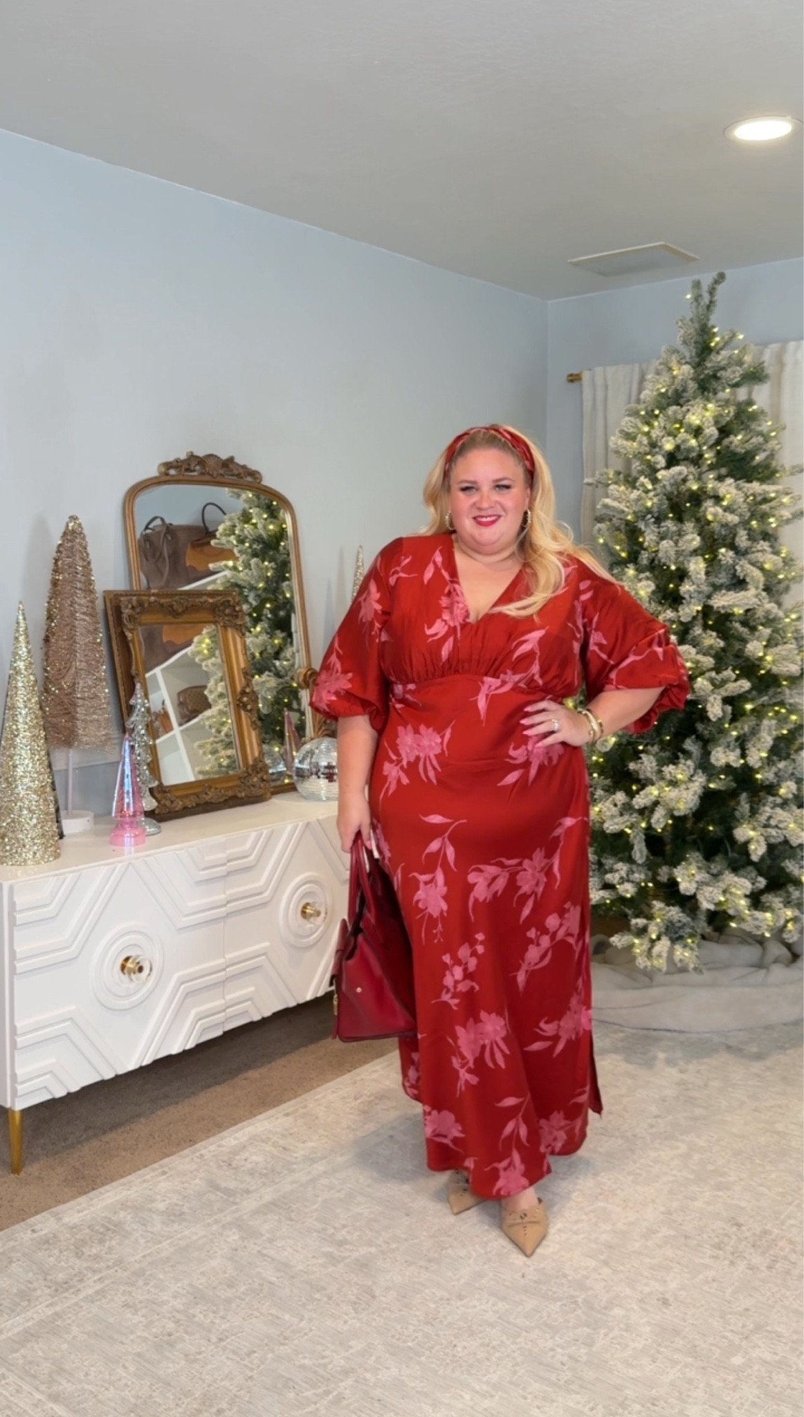 Holiday-ready in the easiest way possible.

This satin floral dress gives you shape without clinging, the sleeves are comfortable, and the color is rich enough to look expensive. I styled it with pointed nude heels to elongate the leg and a structured red bag to keep everything polished.

Dress size 1X
Heels true to size

Perfect for holiday parties, Christmas events, or anything where you want to look put together without trying too hard.

#LTKHoliday #LTKFindsUnder50 #LTKPlusSize