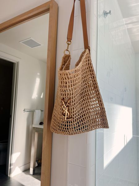Raffia season is here and I am obsessed with this tote and will be using it all summer long. It’s by Saint Laurent and back in stock. Also love that it takes up zero space when you pack it.

#LTKstyletip #LTKtravel #LTKitbag