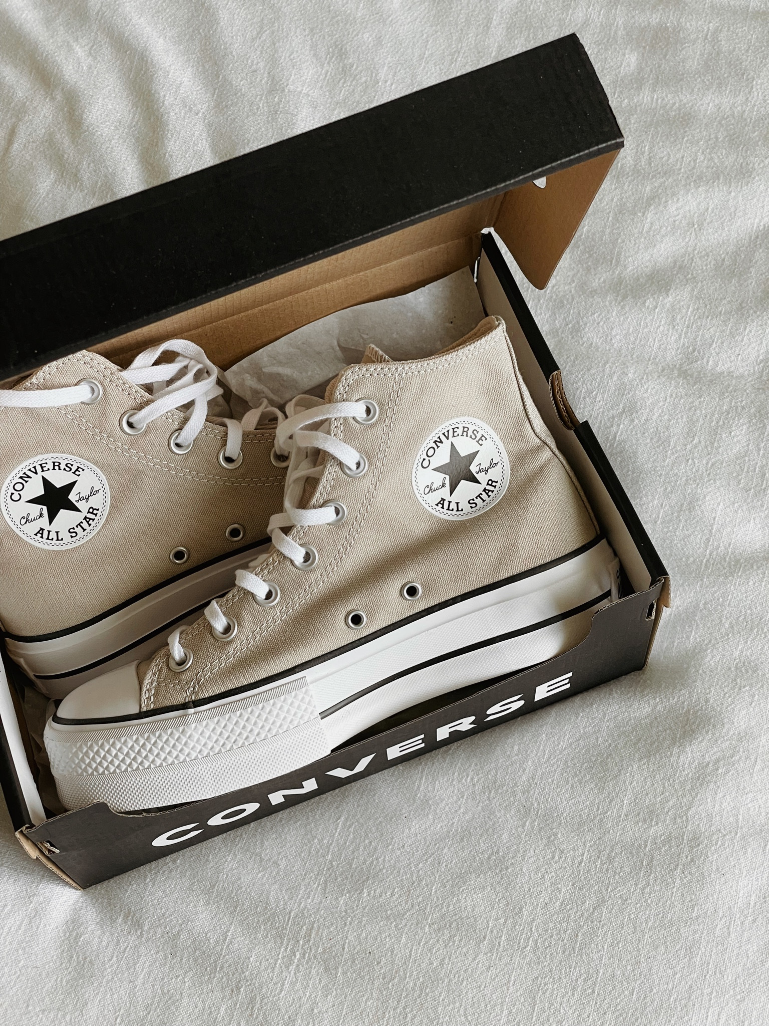 Beige Converse Hightops