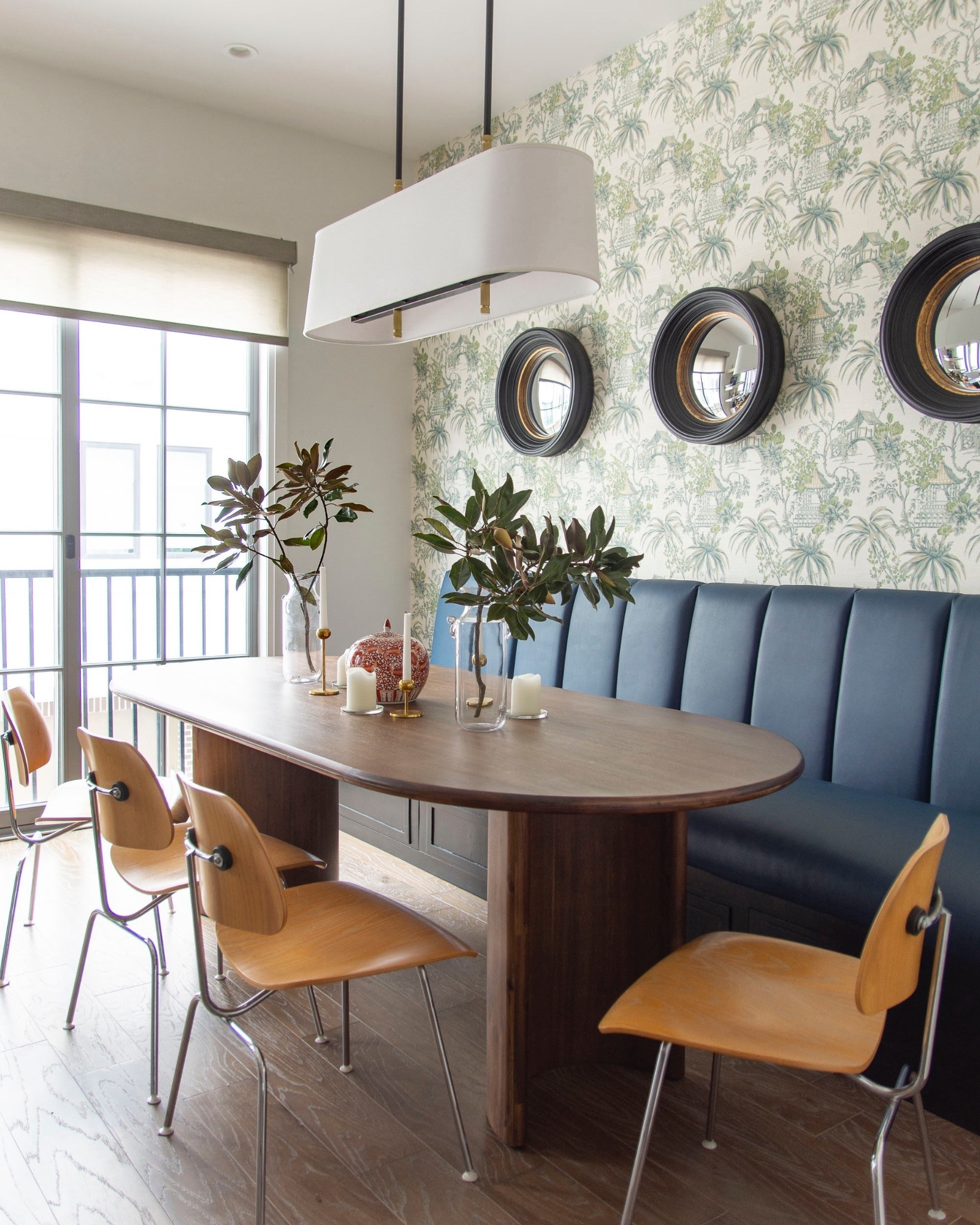 Dining room breakfast nook design with banquette dining bench, modern wood dining table, racetrack oval table, midcentury dining chairs, shade pendant light, and wallpaper 

#LTKHome