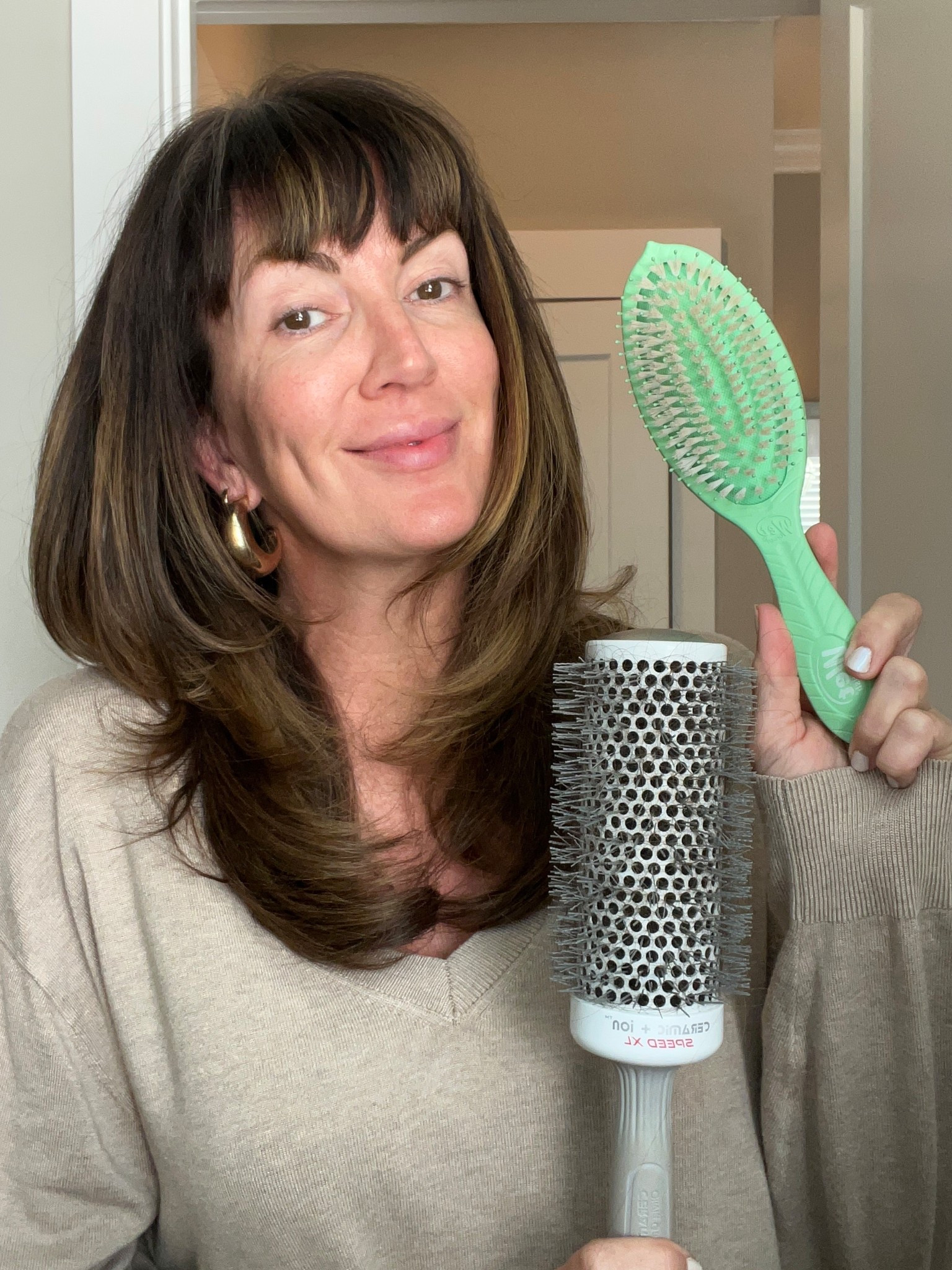 My 2 MUST HAVE BRUSHES for my long hair!! // round brush size 2 1/8 and the green brush is for de tangling wet hair and giving shine to dry hair!!

#LTKFindsUnder50 #LTKOver40 #LTKBeauty