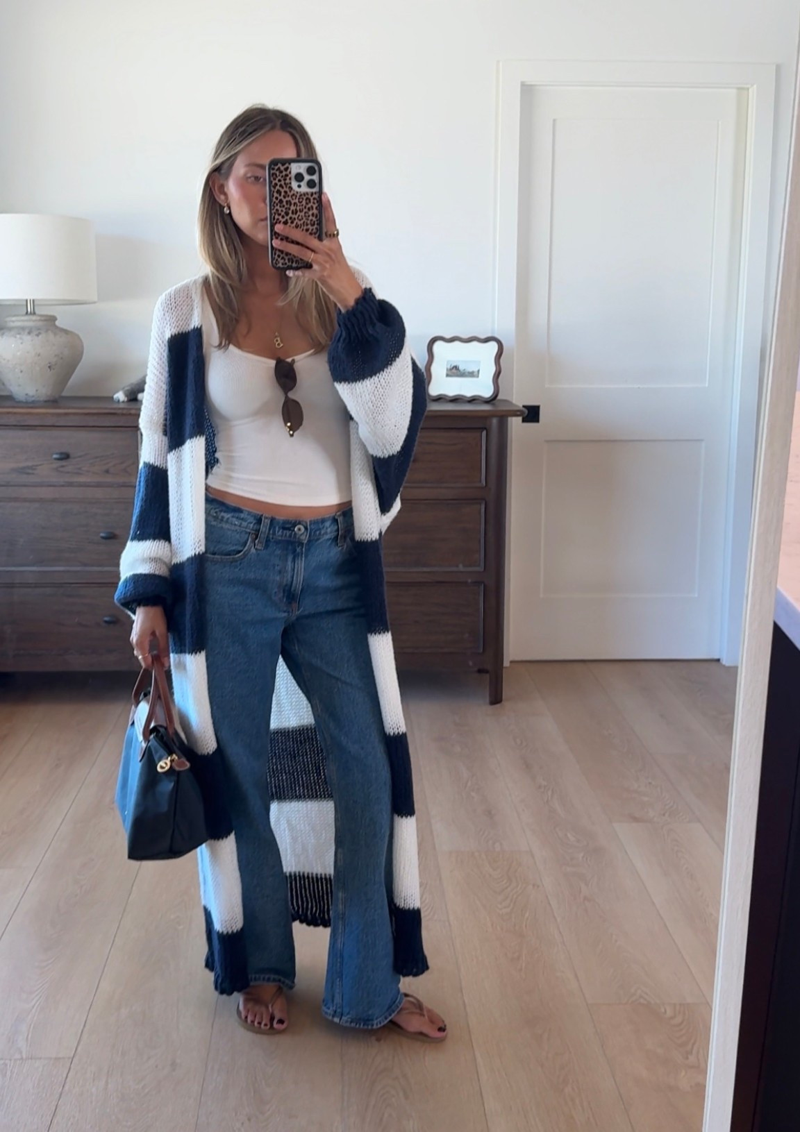 WHAT I’M WEARING: 
Long stripe cardigan was an Amazon find!! So cute and lightweight 
Denim- Abercrombie 
Flip flops - havaianas 
Bag- Longchamp 
Sunnies- Amazon 