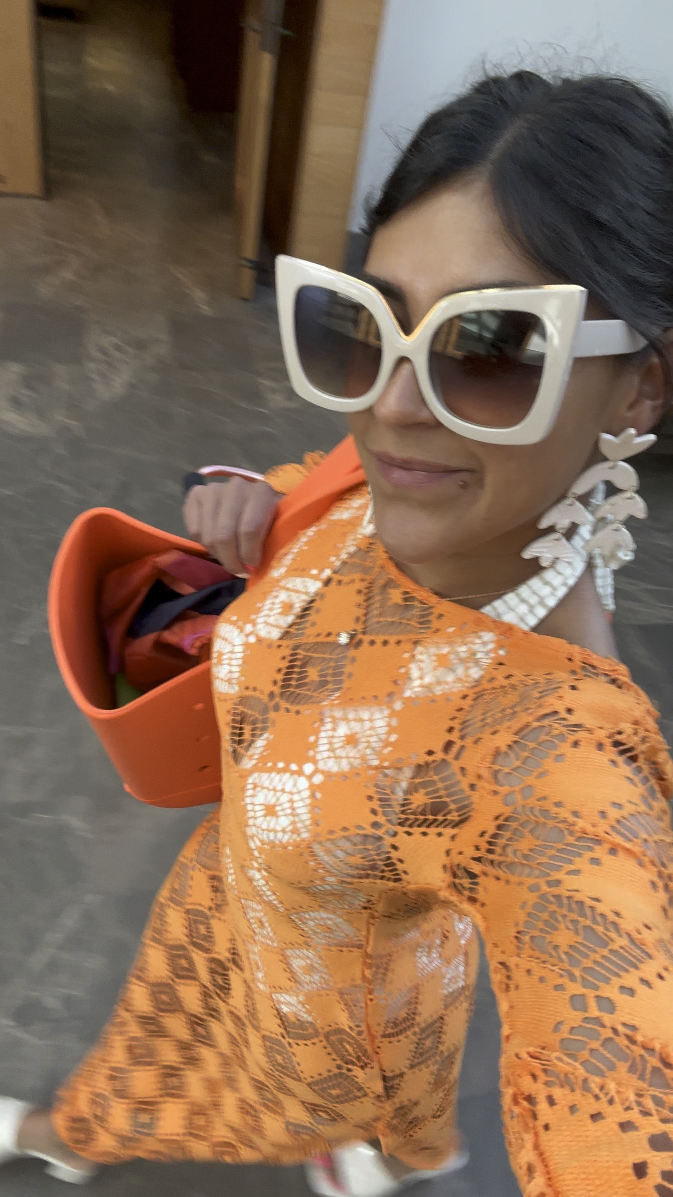 Orange 🍊 crochet coverup and white and gold swimsuit  