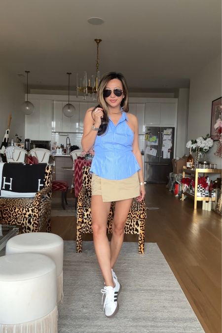 Spring outfit, rich girl style, quiet luxury style, sleeveless button down, skort, affordable outfit, adidas sneakers 