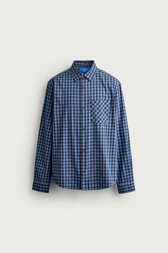 Model height: 188 cmRegular fit shirt made of cotton fabric with a twill structure. Regular colla... | Zara UK