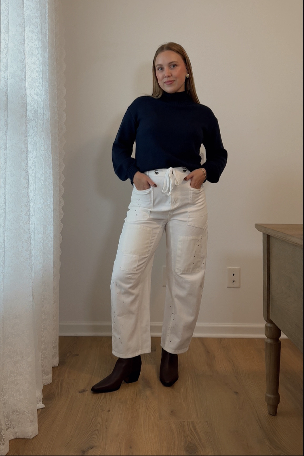 Currently loving navy blue and brown together!
Wearing a 4 jean (usually a 27), small sweater

Neutral style, brown accessories, leather boots, booties, white barrel jeans, wide leg pants, white denim, chic style, casual workwear, earrings 

#LTKShoeCrush #LTKWorkwear #LTKStyleTip