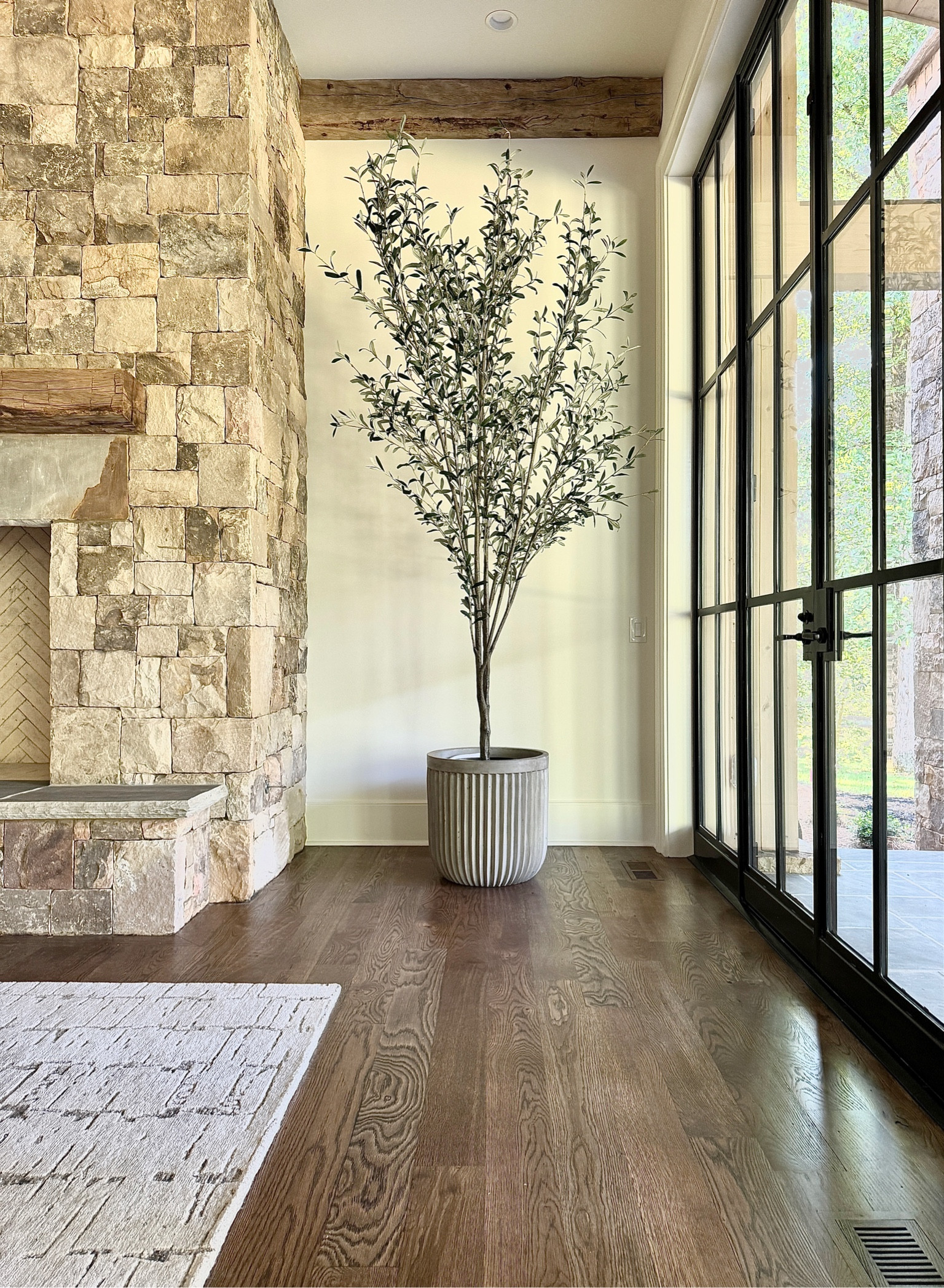 Elevate your space with this designer looking planter and olive tree. 

#LTKHome