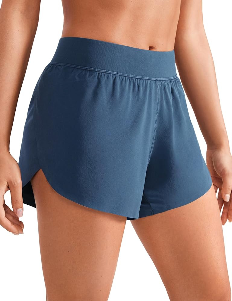 CRZ YOGA Mid Waisted Dolphin Athletic Shorts for Women 4" Lightweight High Split for Gym Workout ... | Amazon (US)