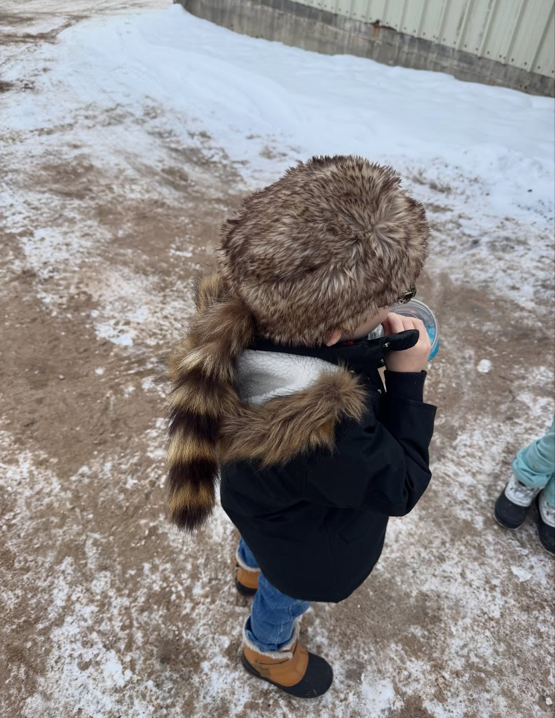 Keep your little one warm and stylish with this classic Raccoon Coonskin Hat for kids. Featuring soft faux fur and the iconic striped tail, it is perfect for winter adventures or dress-up fun. Tap to shop this cozy kids accessory! #KidsFashion #WinterEssentials #CoonskinHat 

 #LTKHoliday #LTKootd #LTKSaleAlert