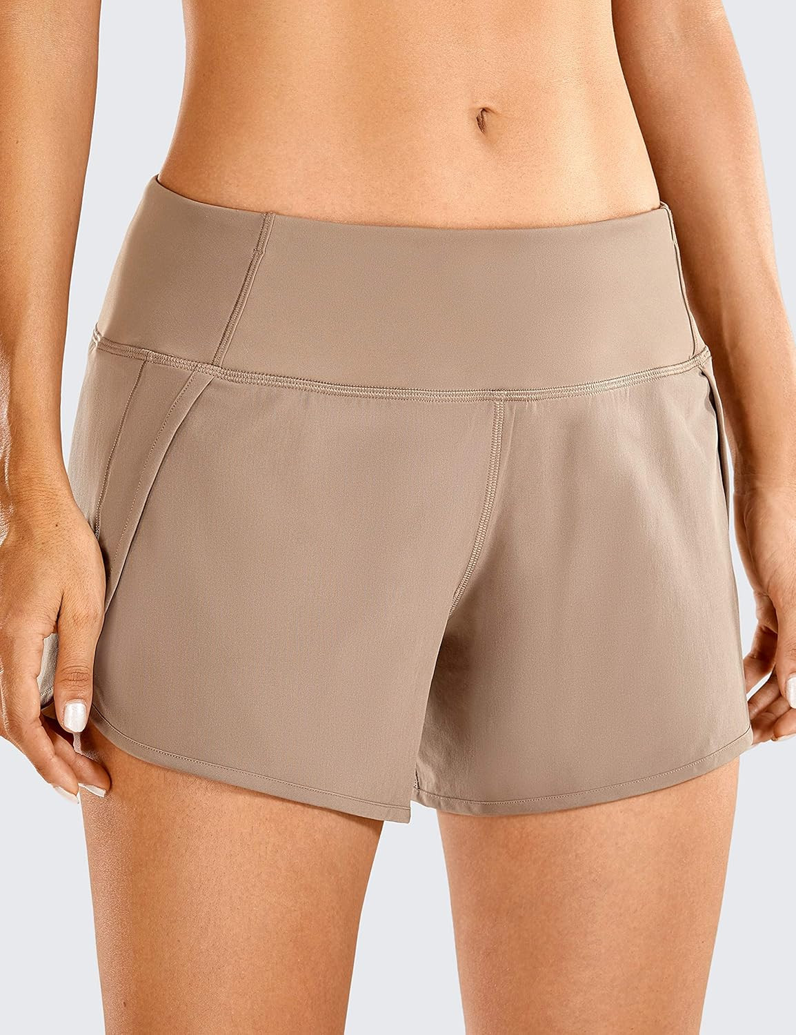 CRZ YOGA Women's Quick-Dry Athletic Sports Running Workout Shorts with Zip Pocket - 4 Inches | Amazon (US)